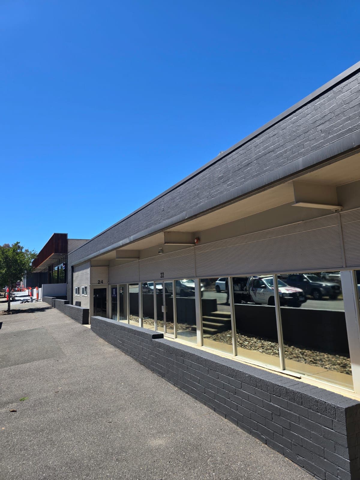 Commercial building exterior repainted by ID Painting, Canberra — photo 5